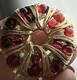 Alfred philippe trifari brooch with red glass cabochon