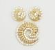 Vintage Alfred Philippe Trifari gold tone crystals swirl brooch and earrings set