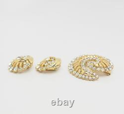 Vintage Alfred Philippe Trifari gold tone crystals swirl brooch and earrings set