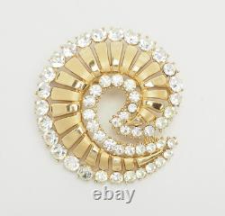 Vintage Alfred Philippe Trifari gold tone crystals swirl brooch and earrings set